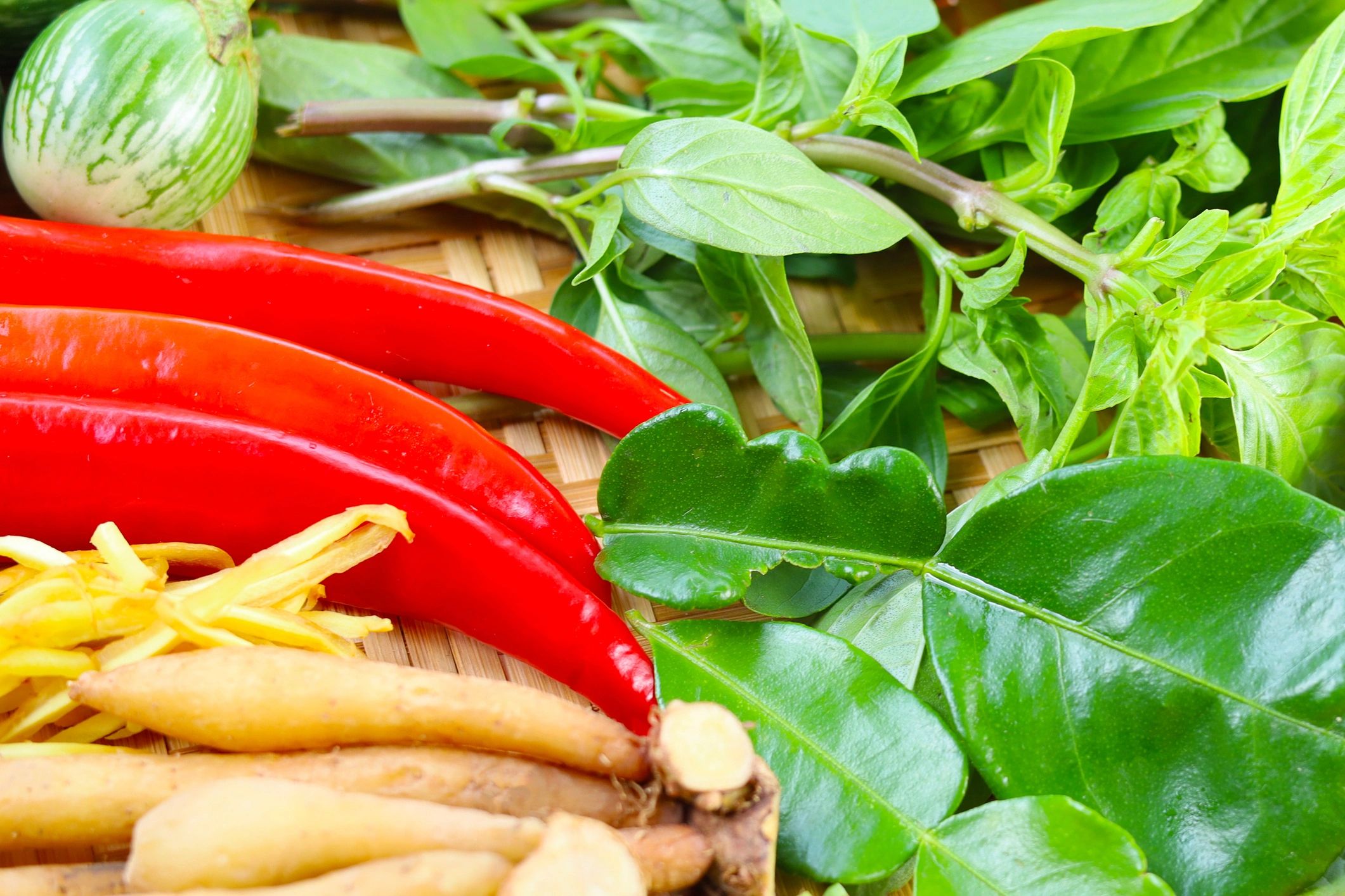 Fresh herbs and vegetables prepared for cooking