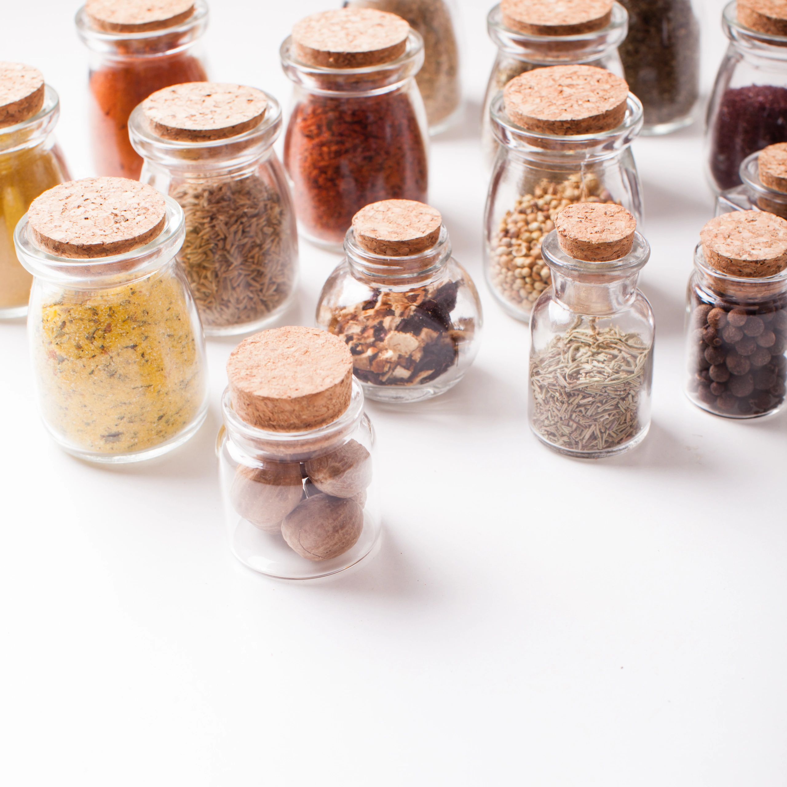 Vintage bottles filled with dry spices